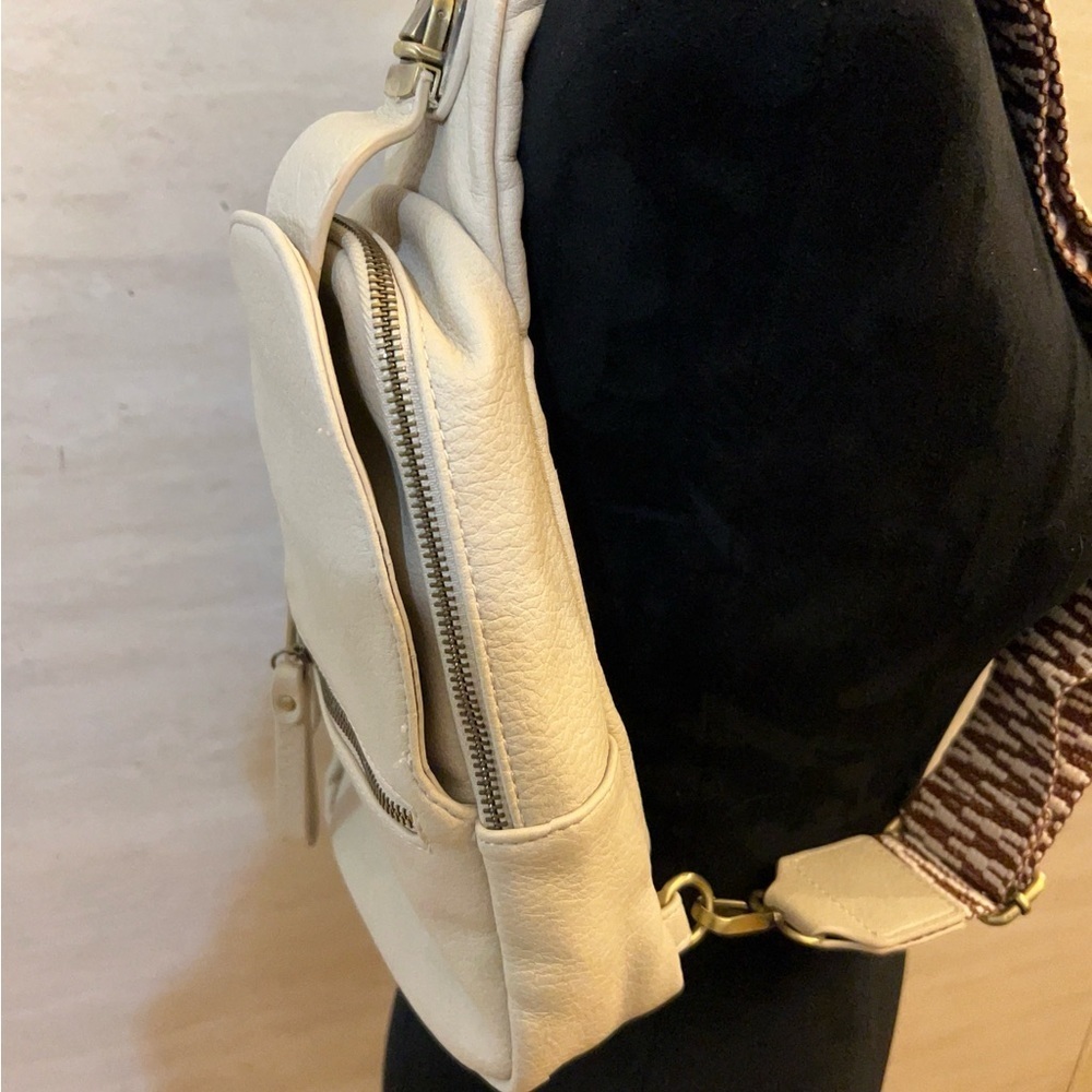 Urban Expressions Liberty leather sling bag with a chevron pattern strap. - Picture 16 of 16